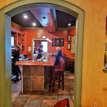 DeAngelo's - Looking into bar from large dining room - Pizza Near Me - Bloomington, Indiana DeAngelo's - Looking into bar from large dining room - Pizza Near Me - Bloomington, Indiana