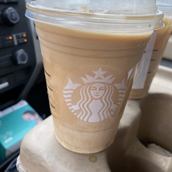 Starbucks - two cups of iced coffee in a car - Coffee & Tea Near Me - Tyler, Texas