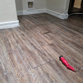 Right Steps Flooring - planks popping up - Flooring Near Me - Tempe, Arizona Right Steps Flooring - planks popping up - Flooring Near Me - Tempe, Arizona