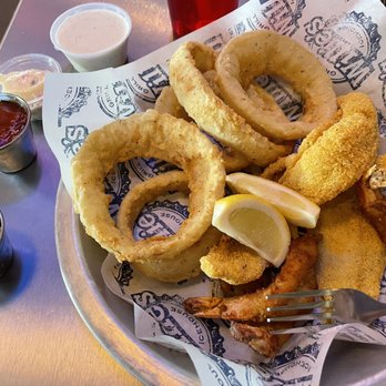 Willie's Grill & Icehouse - Small shrimp and catfish combo with upgraded onion rings. Appropriate sauces for dipping. - American Near Me - Schertz, Texas Willie's Grill & Icehouse - Small shrimp and catfish combo with upgraded onion rings. Appropriate sauces for dipping. - American Near Me - Schertz, Texas