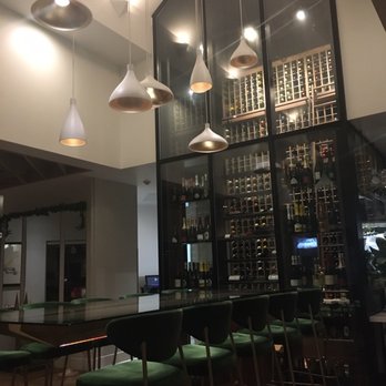 Allora - Wine cellar/ room and cool lighting and velvet green seats - Wine Bars Near Me - Sacramento, California Allora - Wine cellar/ room and cool lighting and velvet green seats - Wine Bars Near Me - Sacramento, California