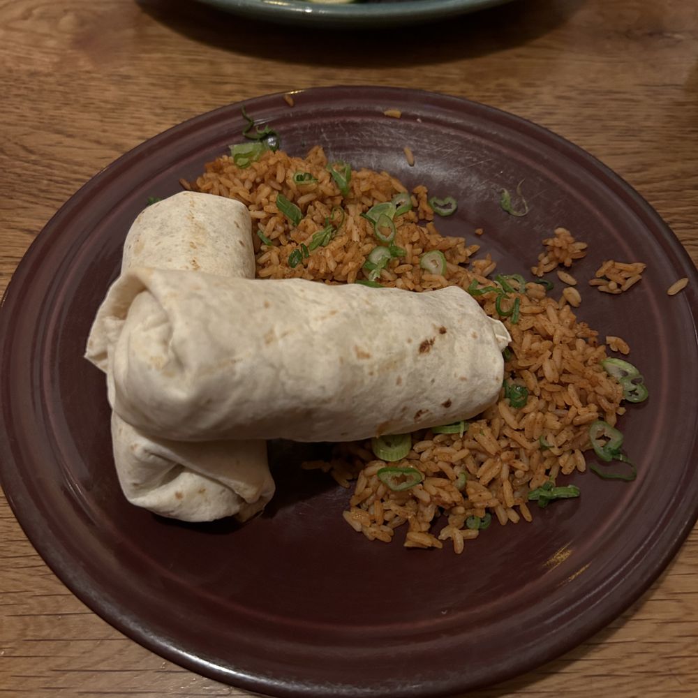 Thai Chicken Burrito: grilled chicken, stir-fried cabbage, vegetables, ancho peanut sauce Thai Chicken Burrito: grilled chicken, stir-fried cabbage, vegetables, ancho peanut sauce