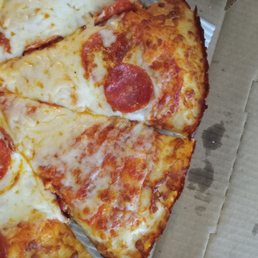 a slice of pepperoni pizza in a box a slice of pepperoni pizza in a box