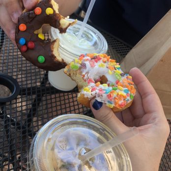 Babe's Doughnuts - Fruity pebbles and chocolate m&m donuts, a cup of milk and honey lavender iced coffee - Donuts Near Me - Tuscaloosa, Alabama Babe's Doughnuts - Fruity pebbles and chocolate m&m donuts, a cup of milk and honey lavender iced coffee - Donuts Near Me - Tuscaloosa, Alabama