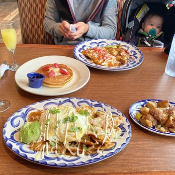 El Torito - I got chilaquiles with potatoes instead of beans. Pancakes, and juevos rancheros in back. - Mexican Near Me - Monterey, California El Torito - I got chilaquiles with potatoes instead of beans. Pancakes, and juevos rancheros in back. - Mexican Near Me - Monterey, California