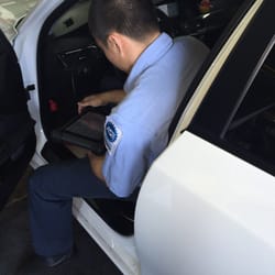 Hi-Tech Auto Repair - Michael working on my car while I wait.