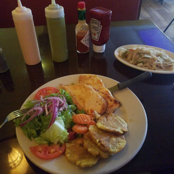 El Balconcito - Grilled chicken with side salad, tostones and side of grilled onions - Peruvian Near Me - Philadelphia, Pennsylvania El Balconcito - Grilled chicken with side salad, tostones and side of grilled onions - Peruvian Near Me - Philadelphia, Pennsylvania