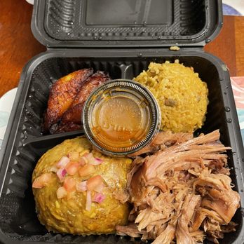 El Lechon De Negron - a meal in a styrofoam container - Food Trucks Near Me - Union, New Jersey El Lechon De Negron - a meal in a styrofoam container - Food Trucks Near Me - Union, New Jersey