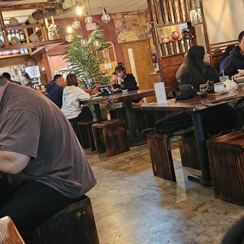 AJI Ramen - people sitting at tables in a restaurant - Ramen Near Me - Katy, Texas AJI Ramen - people sitting at tables in a restaurant - Ramen Near Me - Katy, Texas