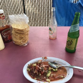 Chuchulukos y Aguachiles El Sinaloa - a plate of food on a table - Mexican Near Me - Phoenix, Arizona Chuchulukos y Aguachiles El Sinaloa - a plate of food on a table - Mexican Near Me - Phoenix, Arizona