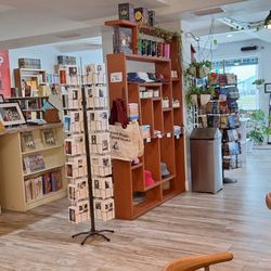 Karma Coffee and Books - This is looking toward the entrance (notice the books, cards, etc.) from most of the seating