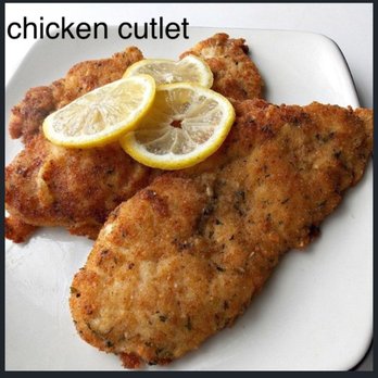 Kings 7 - a plate of chicken cutlets with lemon slices - Delis Near Me - Brooklyn, New York Kings 7 - a plate of chicken cutlets with lemon slices - Delis Near Me - Brooklyn, New York