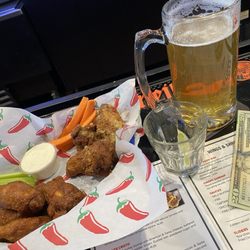 Bout Time Pub & Grub - Garlic and Parmesan wings and captain Morgan teriyaki wings. FIREEEEE!