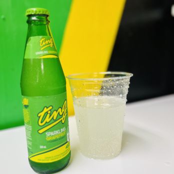 Irie Jamaican Cuisine - Jamaican favorite Ting Sparkling Grapefruit Soda - Caribbean Near Me - Chattanooga, Tennessee Irie Jamaican Cuisine - Jamaican favorite Ting Sparkling Grapefruit Soda - Caribbean Near Me - Chattanooga, Tennessee