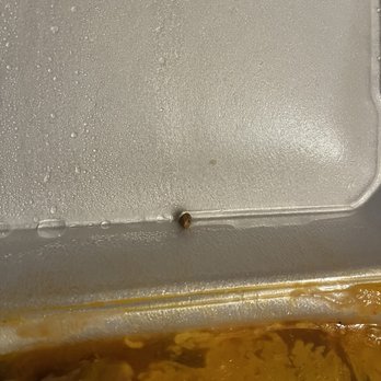 La Frontera - Actual Rock/pebble found it chimichanga, pulled out of my mouth after taking a bite :( - Mexican Near Me - Midvale, Utah