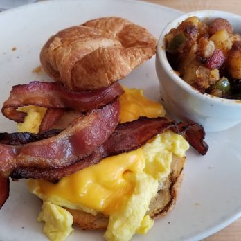 Big Pink - Bacon, Egg and Cheese Croissant with Potatoes - Pizza Near Me - Miami Beach, Florida Big Pink - Bacon, Egg and Cheese Croissant with Potatoes - Pizza Near Me - Miami Beach, Florida