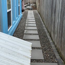 E & B Landscaping - new walk way.  the cement down the stepping stones and the border.