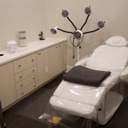 Precision Hair Removal & Skin Care - Body wrapping and waxing room