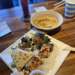 Regular chicken kabob with sides of salad and rice. Fries were delish! Regular chicken kabob with sides of salad and rice. Fries were delish!
