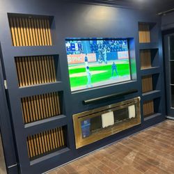 S&A Quality Pro Services - Build  custom  Entertainment  center  in edge water NJ. 
Customer  wanted acoustic wood panels  on thw back of thw shelf  with LED lights