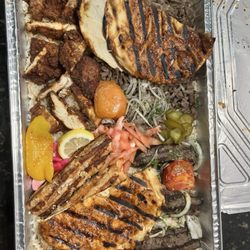 Alammar Kabob - This amazing platter includes Hummus, rice, garlic paste and salad feeds 6-8   Delicious!!!!