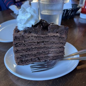 Barbara's Fishtrap - A tower of chocolate cake - Seafood Near Me - Half Moon Bay, California Barbara's Fishtrap - A tower of chocolate cake - Seafood Near Me - Half Moon Bay, California