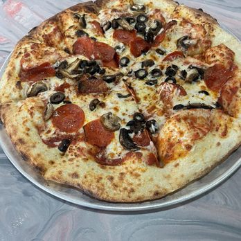 Punk Rock Pizza - Hand made build your own pizza. - Pizza Near Me - Daytona Beach, Florida Punk Rock Pizza - Hand made build your own pizza. - Pizza Near Me - Daytona Beach, Florida