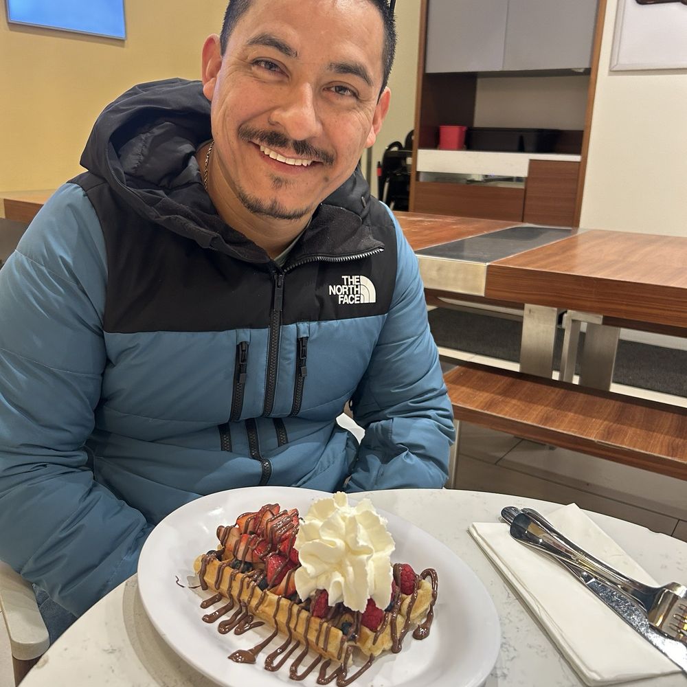 Nutella Cafe - Nutella waffles with berries and whipped cream - Desserts Near Me - Chicago, Illinois Nutella Cafe - Nutella waffles with berries and whipped cream - Desserts Near Me - Chicago, Illinois