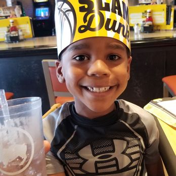 Buffalo Wild Wings - This little guy loves restaurant tchotchkes. - Sports Bars Near Me - Iselin, New Jersey Buffalo Wild Wings - This little guy loves restaurant tchotchkes. - Sports Bars Near Me - Iselin, New Jersey