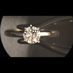 The ring magnified 10x to assure the jeweler isnt swapping out my stone for a yellow diamond at Walmart lol