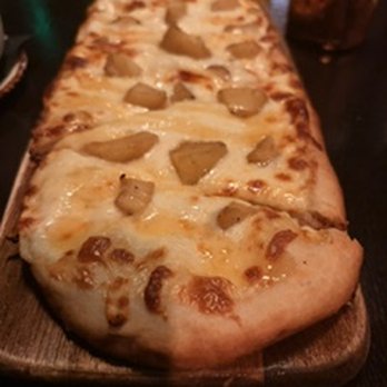 The Conspiracy - apple & cheese flatbread - Cocktail Bars Near Me - Charlotte, North Carolina The Conspiracy - apple & cheese flatbread - Cocktail Bars Near Me - Charlotte, North Carolina