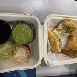 Veg samosa plate with spicy chili/mint and sweet tamarind chutney