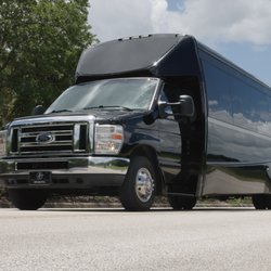 FTS Limousine & Black Car - 24-Passenger Mini Bus waiting at FBO: University Air Center in Gainesville, Florida