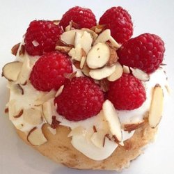 Cinnaholic - Amaretto Frosting, Raspberries & Sliced Almonds!