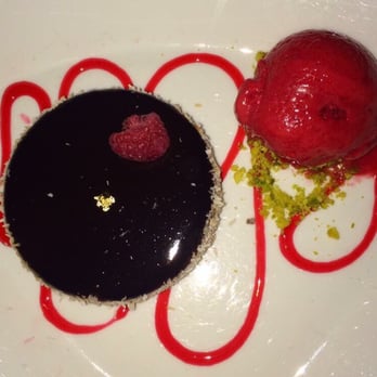 Ciel de Paris - Chocolate cake and raspberry sorbet dessert. - Modern European Near Me - Paris, 75 Ciel de Paris - Chocolate cake and raspberry sorbet dessert. - Modern European Near Me - Paris, 75
