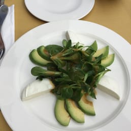 Mache salad with avocado and burata
