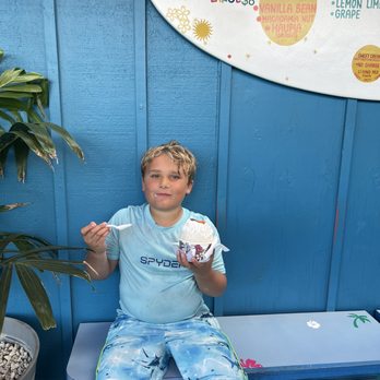 Honu Shave Ice  - Just my kid enjoying his piña colada shaved ice!! - Ice Cream & Frozen Yogurt Near Me - Kapaʻa, Hawaii