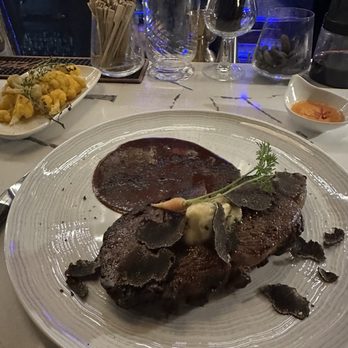 Il Girasole - Dry aged ribeye with side of roasted cauliflower - Italian Near Me - Costa Mesa, California Il Girasole - Dry aged ribeye with side of roasted cauliflower - Italian Near Me - Costa Mesa, California