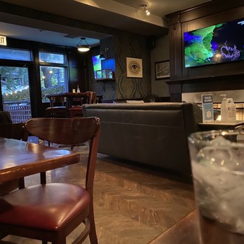 Lark - The sofas in front of fireplace - Pizza Near Me - Chicago, Illinois Lark - The sofas in front of fireplace - Pizza Near Me - Chicago, Illinois