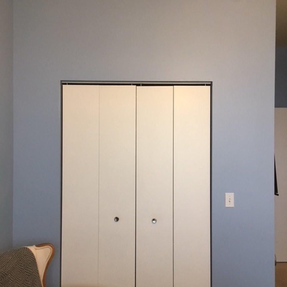 Master bedroom closet (before).  Standard bifold doors 48 in wide x 80 in high