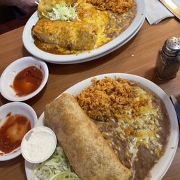 #5 enchilada style ($3.25 extra) and chicken mix chimichanga (front). #5 enchilada style ($3.25 extra) and chicken mix chimichanga (front).