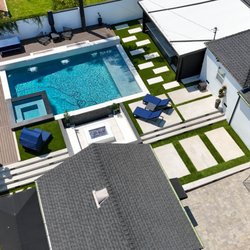 Exodus Construction & Remodeling - Complete Backyard Renovation, inground pool and spa, patio, outdoor kitchen, artificial turf