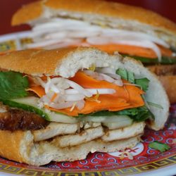 Lucy's Vietnamese Bushwick - Lemongrass Tofu Banh Mi, w/ house garlic aioli, house marinade, pickled carrots, bean sprouts, cilantro, & more. Request no aioli for vegan.