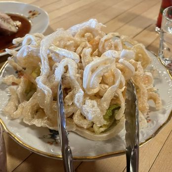 Cabane à Sucre Au Pied de Cochon - Fried lard over bitter endive salad. Delicious - Canadian (New) Near Me - Mirabel, Quebec Cabane à Sucre Au Pied de Cochon - Fried lard over bitter endive salad. Delicious - Canadian (New) Near Me - Mirabel, Quebec