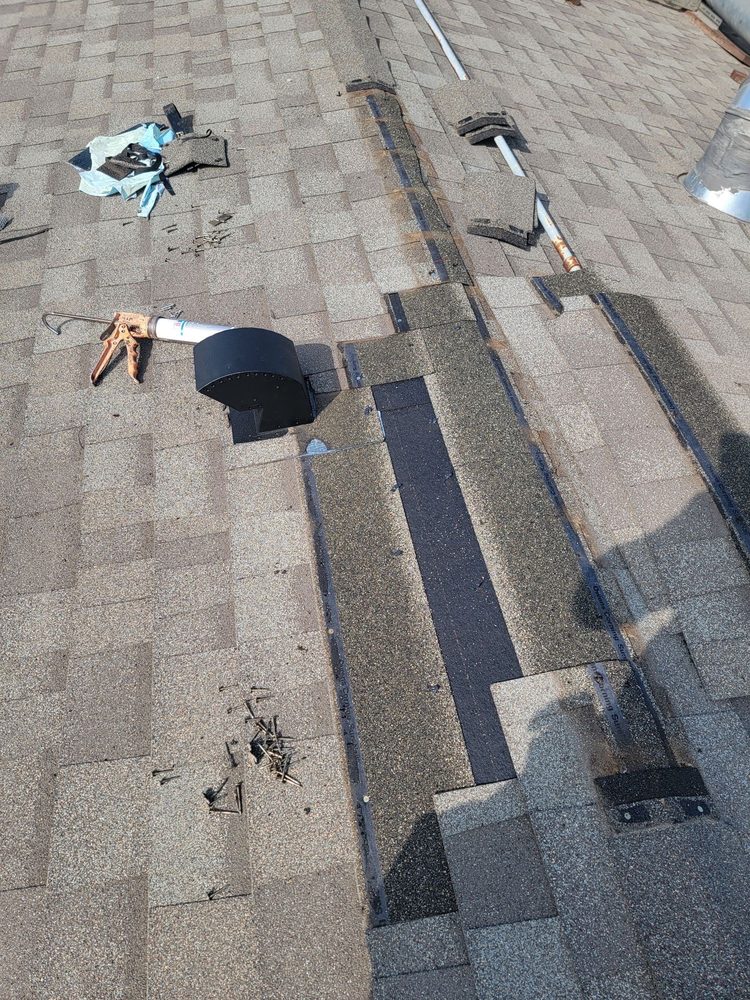 Slide of Over & Above Roofing