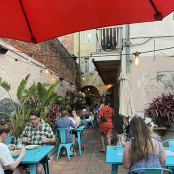 Cane and Table - Cutest little courtyard patio - Cocktail Bars Near Me - New Orleans, Louisiana