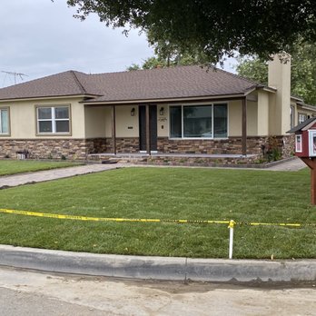 EC Irrigation Repair - a home in a residential neighborhood - Irrigation Near Me