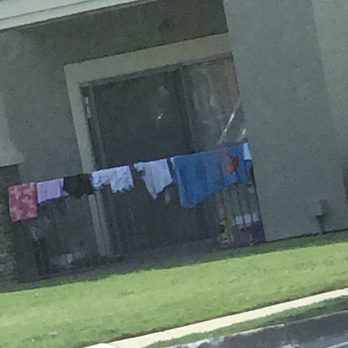 Olympus Stone Glen - Clothes hanging over the balcony is usually not allowed in most reputable complexes. - Apartments Near Me - Keller, Texas