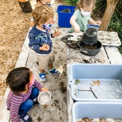 Arlington Unitarian Cooperative Preschool - Our 2-year-olds playing in the mud kitchen
