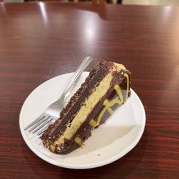 Some sort of dark chocolate pistachio cheesecake type dessert. All I can say is it was a WOW experience!!!! Some sort of dark chocolate pistachio cheesecake type dessert. All I can say is it was a WOW experience!!!!